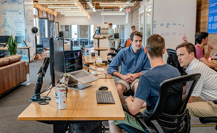 Sound masking system in a flexible workspace improving acoustic comfort, supporting privacy, and helping reduce noise in a dynamic, shared environment.